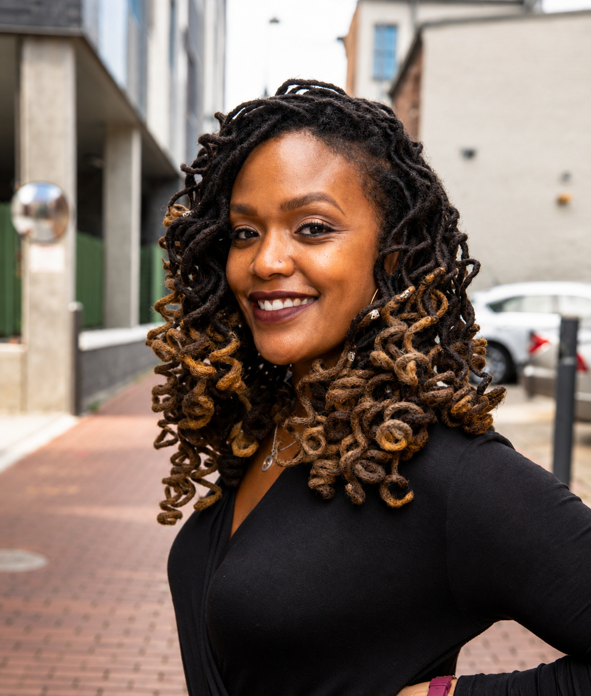 Styled locs with curly ends